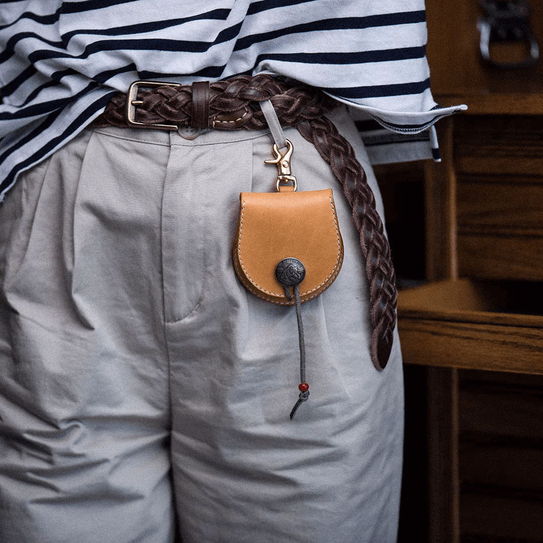 Cover_for_earbuds_case_on braided belt